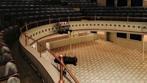 An amphitheater with numerous seats for the audience