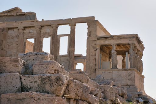 A scenic view of the Caryatid porch of the Erechtheion in Athens, Greece