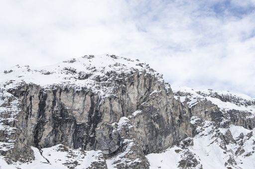 A Beautiful view of the mountain covered in snow on a cold winter day
