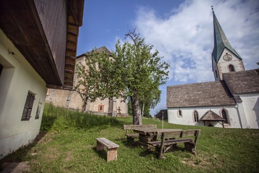 A low angle shot of small Christian churches in the countryside in Slovenia during the daytime
