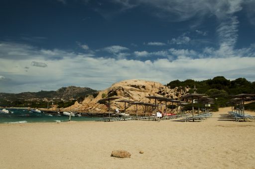 A beautiful shot of the beach under a blue cloudy sky