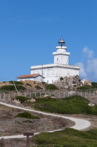 A vertical shot of the Capo Testa Lighthouse in Sardinia, Italy