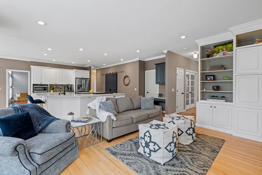 A closeup shot of the interior of a modern living room with a fireplace