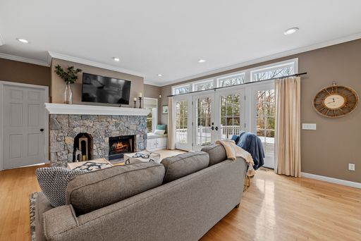 A closeup shot of the interior of a modern living room with a fireplace