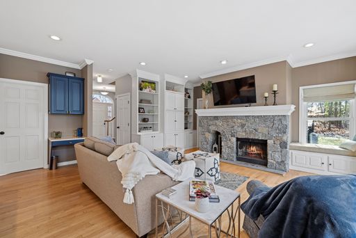 A closeup shot of the interior of a modern living room with a fireplace