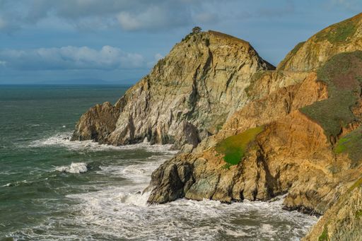 a breathtaking landscape of a coastal cliffside as a scene from the Devil's Bunker, California
