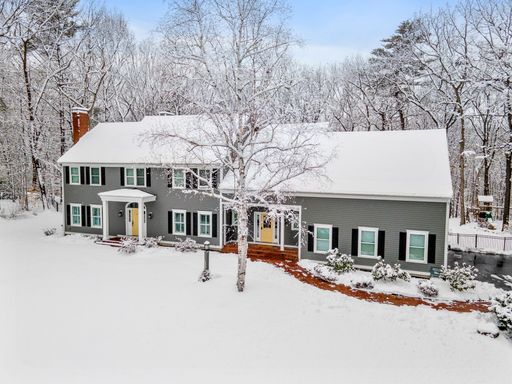 This snowy home has been freshly cleaned and is looking its best in a photo