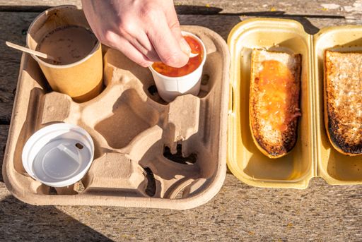 A closeup shot of takeaway breakfast under sunlight outdoors