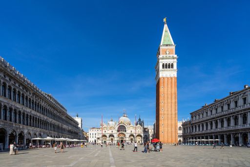 Venice, Italy, Sept. 11, 2020 – Wide view of St. Mark's Square and bell tower St Mark's Basilica. There is the most famous landmark of Venice