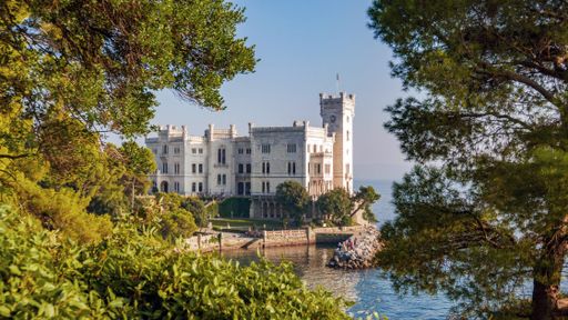 Amazing palace by the sea. Architecture, palace, blue sky, summer, travel, sightseeing, landmark. Miramare, Trieste, Italy
