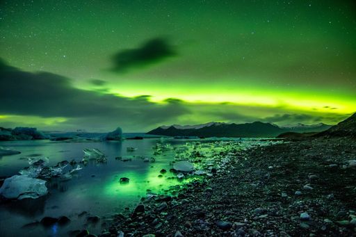 A breathtaking view of Aurora Borealis over the Jokulsarlon lagoon in Iceland