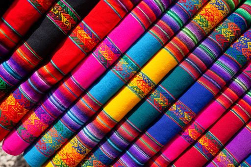 A top view of colorful fabric sold in the open-air market in Morocco