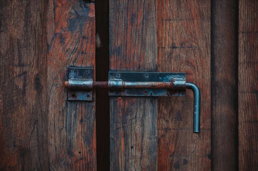 A closeup shot of the vintage bolts on the door