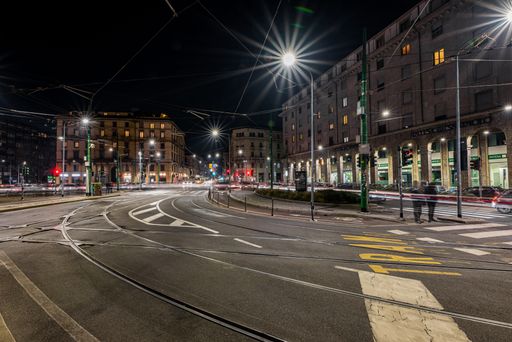 A beautiful shot of a wide road in navigli district of milan italy during a winter evening