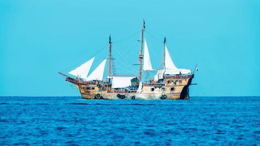 The aged Pirate Ship Vallarta sailing in the ocean