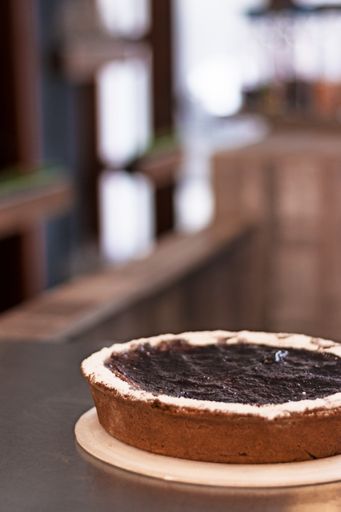 A selective focus shot of an appetizing cake with jam