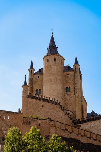 The historic Alcazar Castle against a clear sky, Segovia, Spain