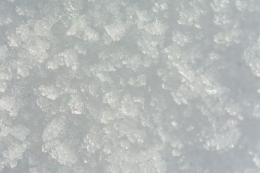 A closeup shot of the pure white snow-a good background