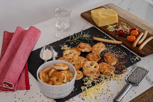 A high-angle shot of ready Kringle cookies and other ingredients on the table