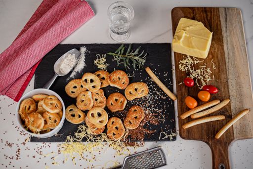 A top view of ready Kringle cookies and other ingredients on the table