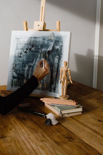 painting on a canva in the morning light