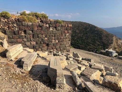 A scenic view of an old theatre ruins in Milos, Greece
