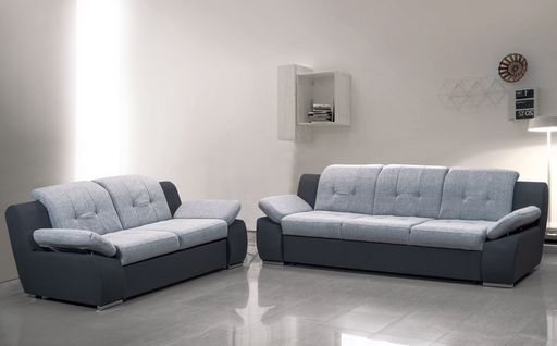 A beautiful minimalist living room with white and gray colors sofa