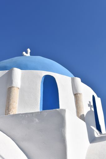 A bottom view shot of an old traditional chapel in Greek island of Ios