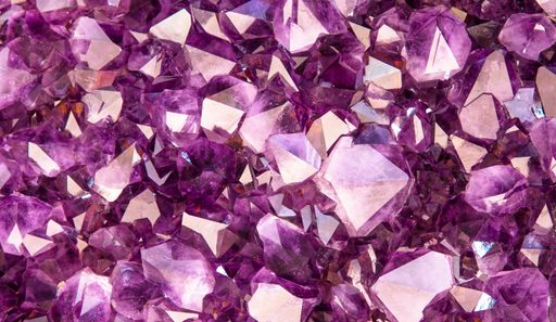 A beautiful violet background and texture with amethyst crystals