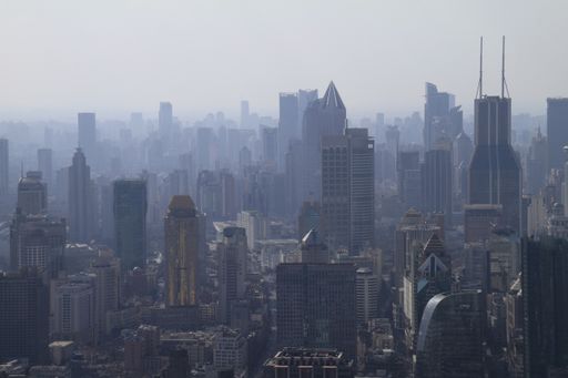 A beautiful shot of city buildings under a foggy sky in Pudong, china