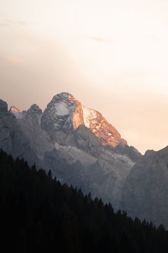A vertical shot of Drei Zinnen Natural Park in Sexten, Italy during sunset