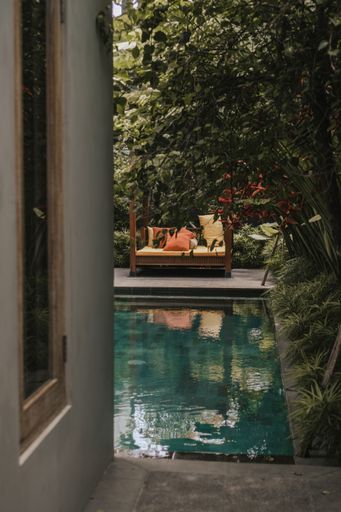 A vertical shot of a pool in Canggu, Bali