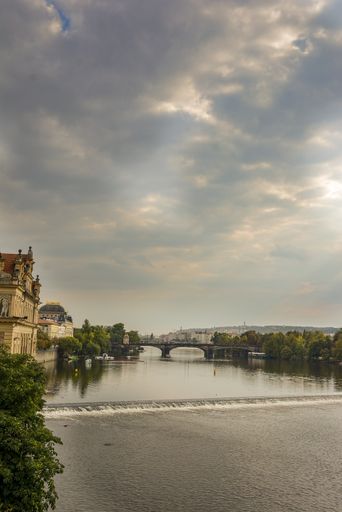 A vertical shot of The Charles Bridge in Prague over the Vltava River in the Czech Republic
