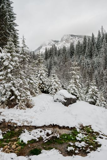 Snowy mountain landscape on a cloudy day