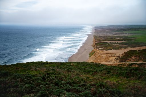 A beautiful view of the Pacific Ocean waves washing the coast