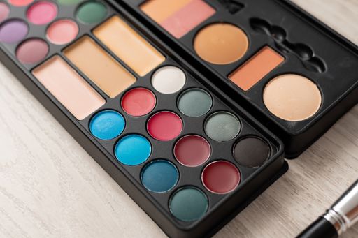 A closeup shot of a colorful eyeshadow palette