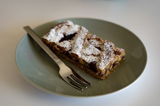 A closeup shot of a piece of pie on a plate