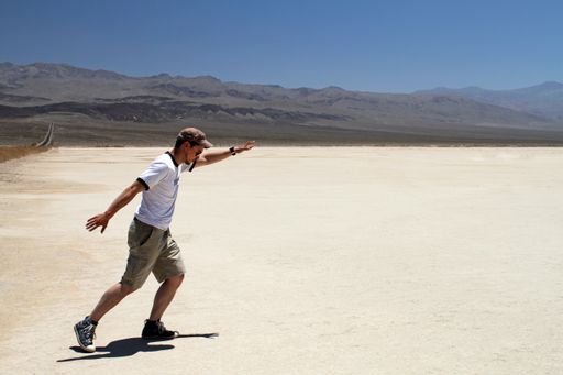 A wide angle shot of a man in the Death Valley National Park in the USA