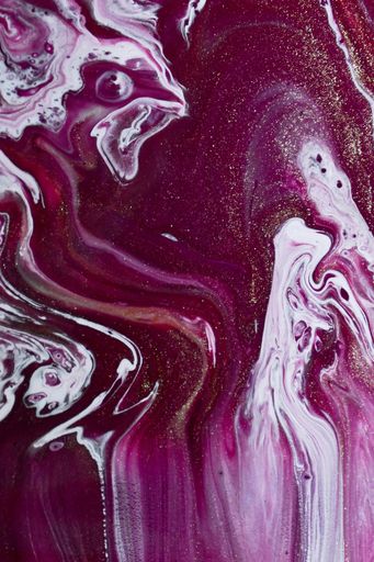 A vertical shot of beautiful oily painting with mixed colors - perfect for background or wallpaper