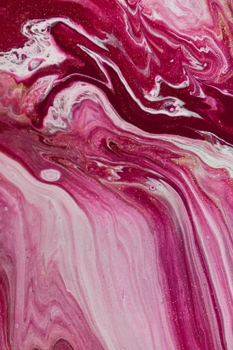 A vertical shot of beautiful oily painting with mixed colors - perfect for background or wallpaper