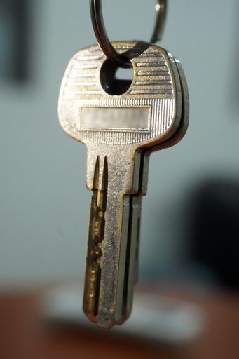 A vertical shot of keys on a blurred background