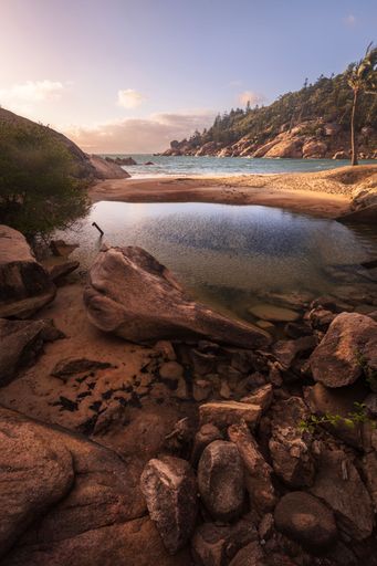 An idyllic view of the rocky Alma Bay on Magnetic Island in Townsville, Queensland, Australia