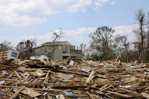 A wide angle shot of the destruction of buildings as a result of a hurricane