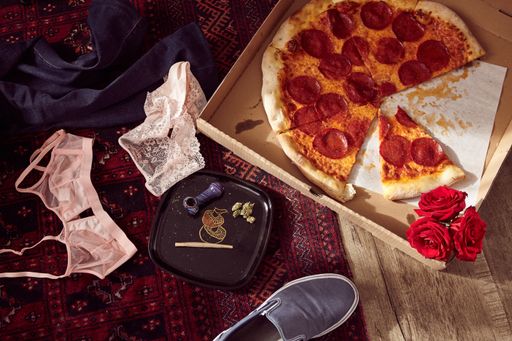 Pizza and Lovin': Hemp/Cannabis CBD/THC Joint and flower with pizza on the floor with clothes, jeans, lingerie and sneaker.