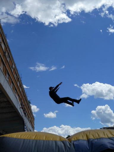Novi Sad, Serbia, May 21st 2019. - Man jumping down to the Inflatable Rescue Cushion (also known as a Jump Cushion or Air Cushion) - rescuing people