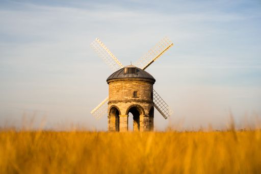 A beautiful view of a Chesterton Windmill in the yellow dry field