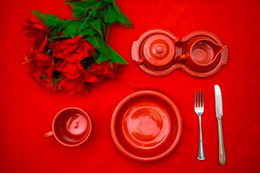 A top view of a beautiful table setting for a romantic dinner