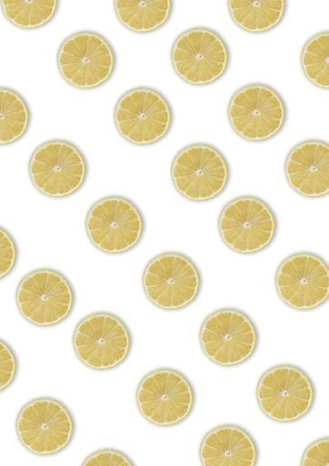 A vertical shot of lemon slices seamless pattern with shadows on a whi background