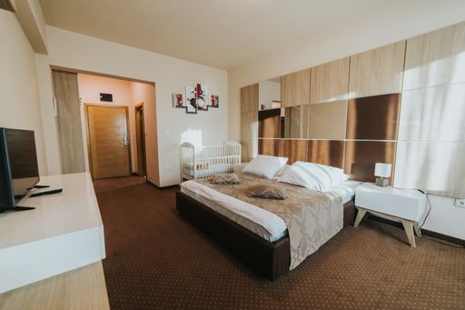 Wide angle shot of hotel room in Bosnia and Herzegovina
