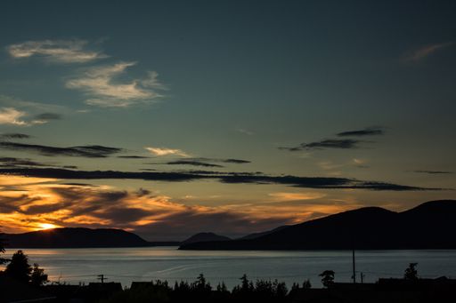 A scenic view of the Sun Juan Islands National Monument during sunset